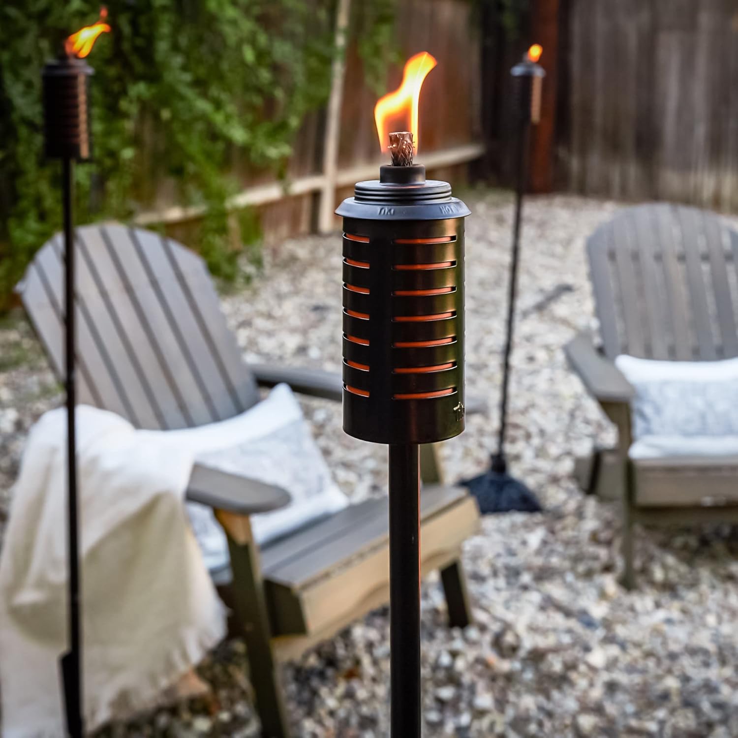 TIKI Metal Black & Orange Easy Install Outdoor Torches, 65-Inch, Weather-Resistant, with Wick & Snuffer, 8 Pack
